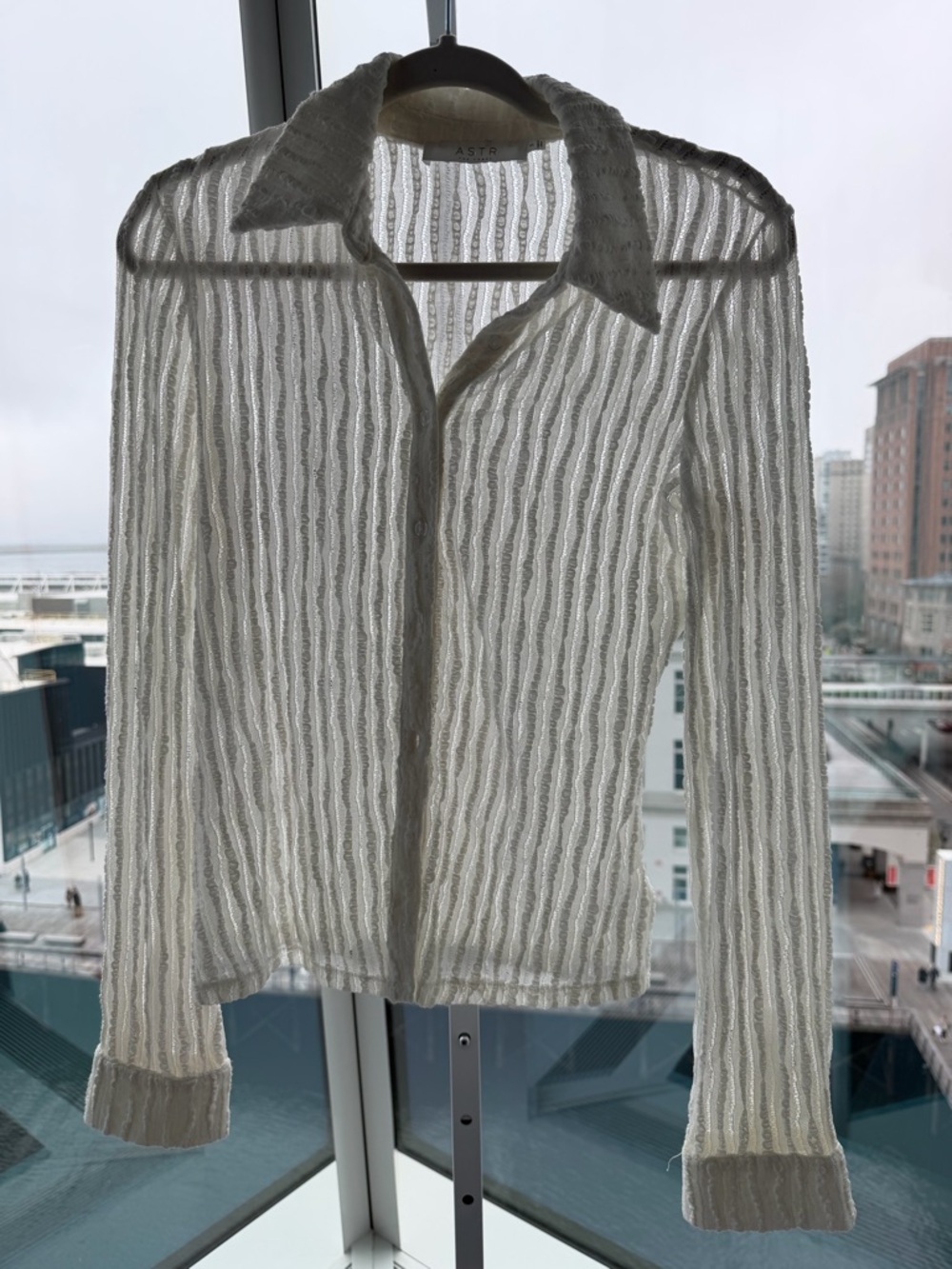 Astr White Sheer Ribbed Button-Up blouse.